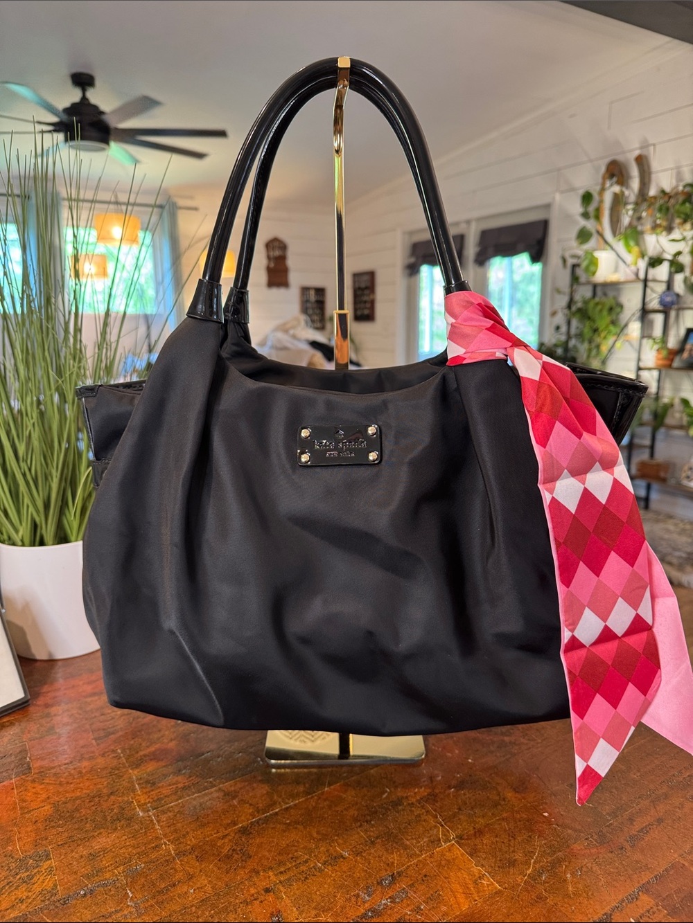 kate spade black nylon tote with pink patterned scarf